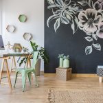 Spacious room with desk chair and decorative chalkboard wall